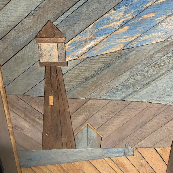 Photo of SIGNED WOOD IN,AYED FRAMED ART OF LIGHTHOUSE AND SAILBOAT