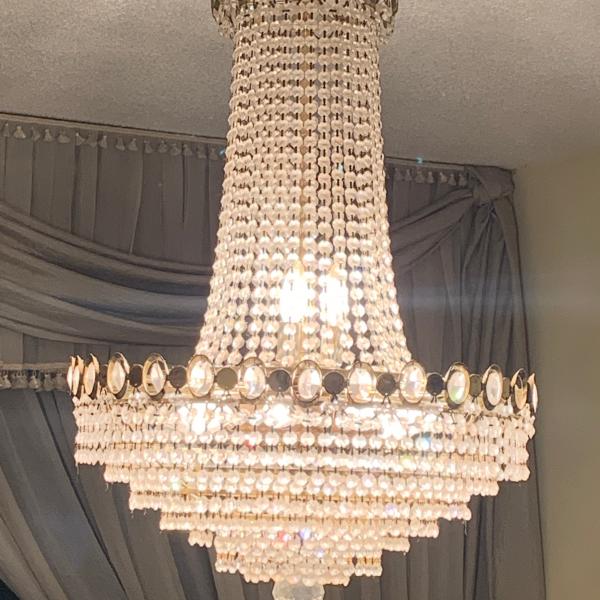 Photo of Crystal chandelier.  In good condition. 