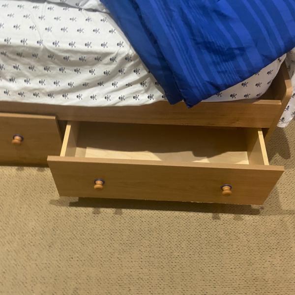 Photo of Like new wood twin captain bed  with 3 drawers plus mattress 