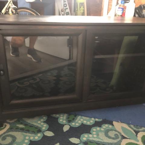 Photo of TV Stand and Electric Range 