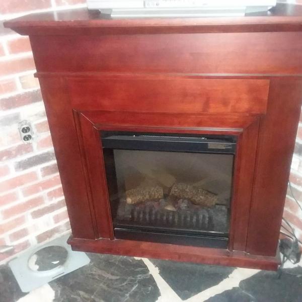Photo of Dimplex Compact Mantle & Media Fireplace