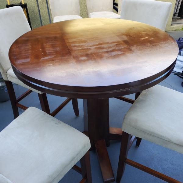 Photo of Wood Round Table (Tall) with Suede Chairs 
