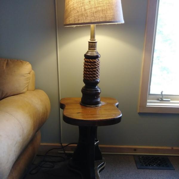 Photo of Hand made wood and rope table lamp.