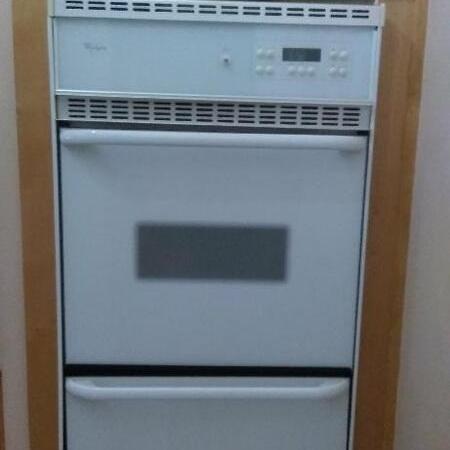 Photo of Whirlpool 24 inch built in gas Wall Oven.  Works well and 