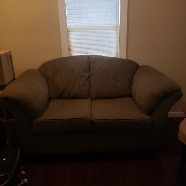Photo of Olive green couch