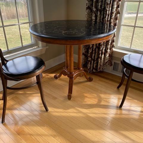 Photo of coffee table with black marble top
