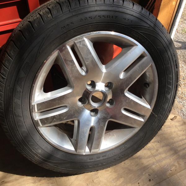 Photo of Brand new tire on brand new aluminum rim
