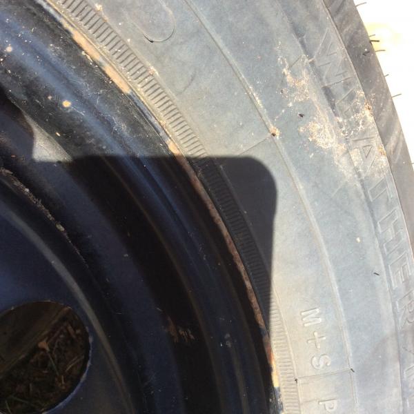 Photo of New tire with rim.