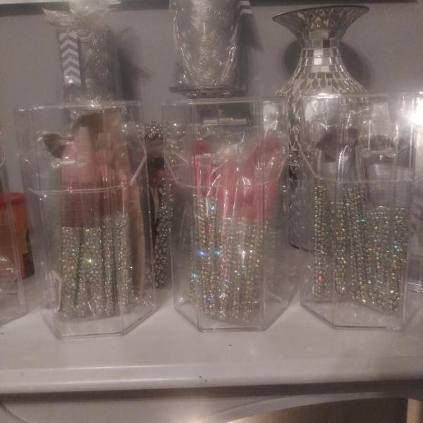 Photo of Blinged make up brushes with clear brush holder with lid.