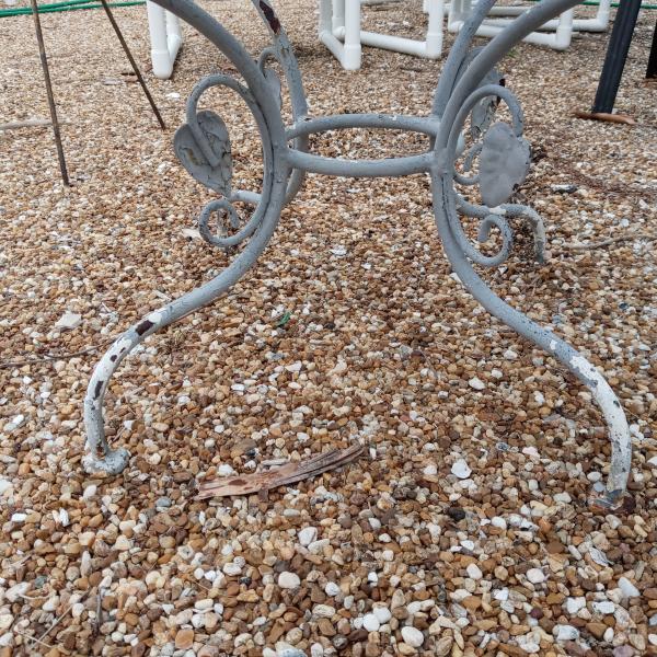 Photo of Vintage iron patio cocktail table