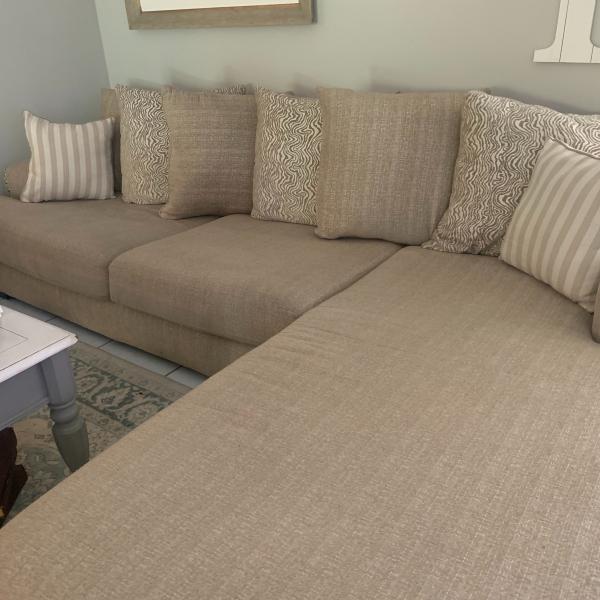 Photo of Sectional with large swivel chair  