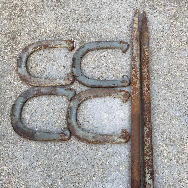 Photo of Horse shoes and stakes