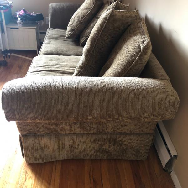 Photo of 2 brown couches