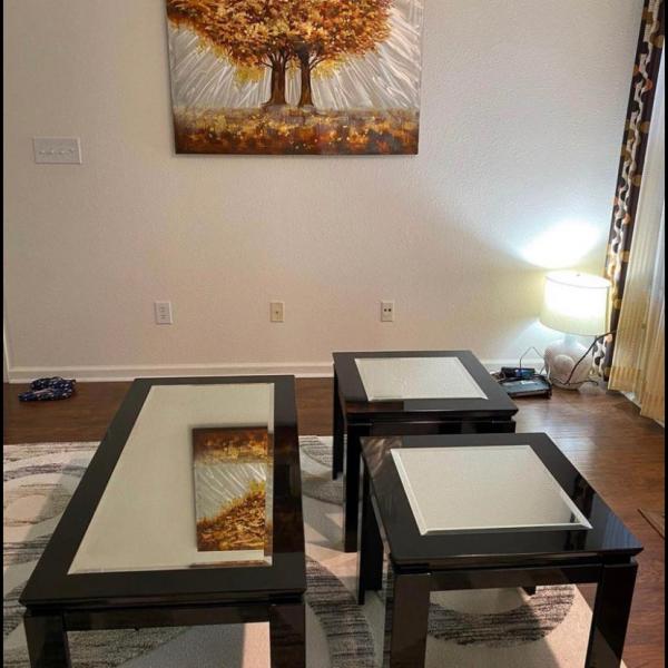 Photo of Coffee table with side tables