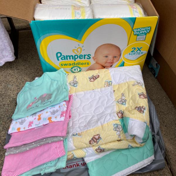 Photo of Baby clothes and toys, plus games 