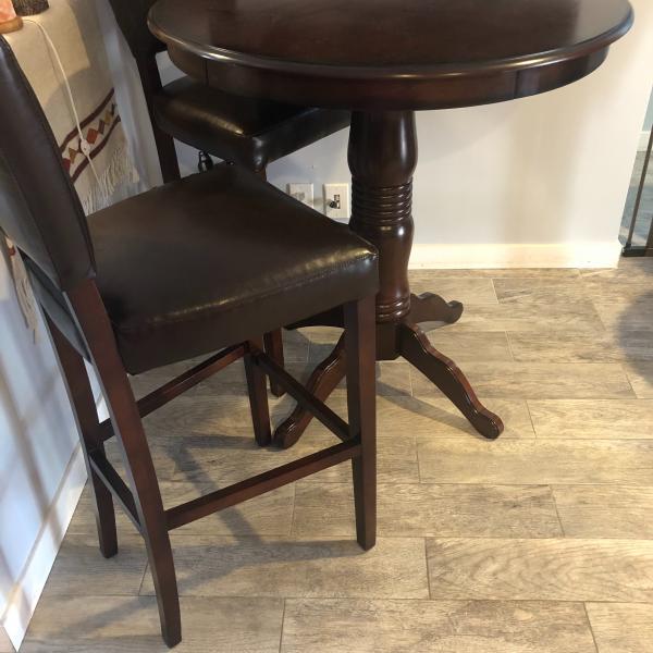 Photo of Pier 1 Dining Table and bar chairs 