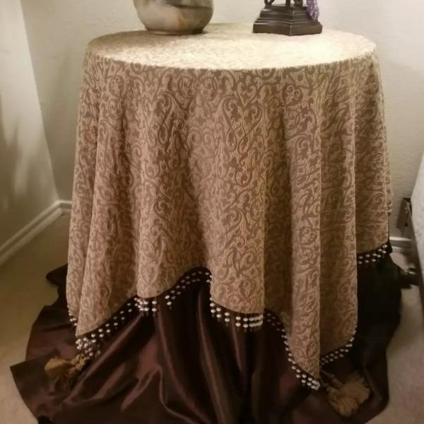 Photo of Custom Table topper and Chocolate underskirt 