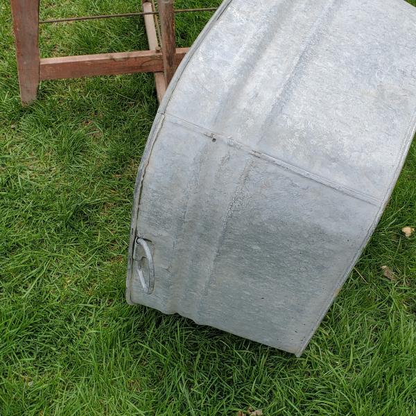 Photo of Primitive galvanised tub on stand understand