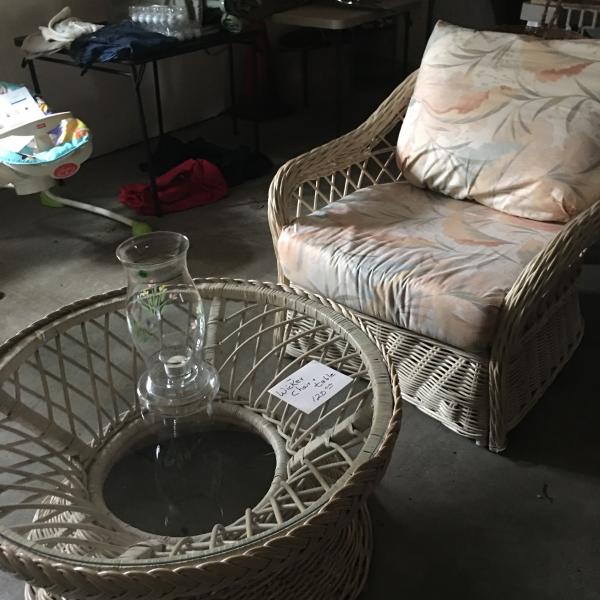 Photo of Wicker chair glass table