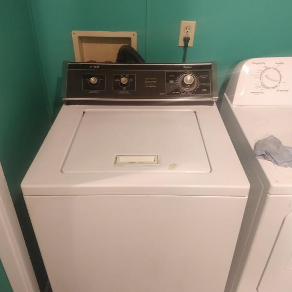 Photo of A white washer wirpool great condition work good 
