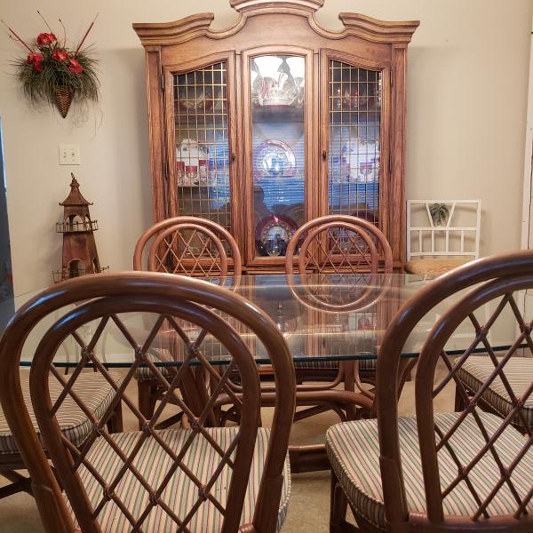 Photo of Table and six chairs and China cabinet 