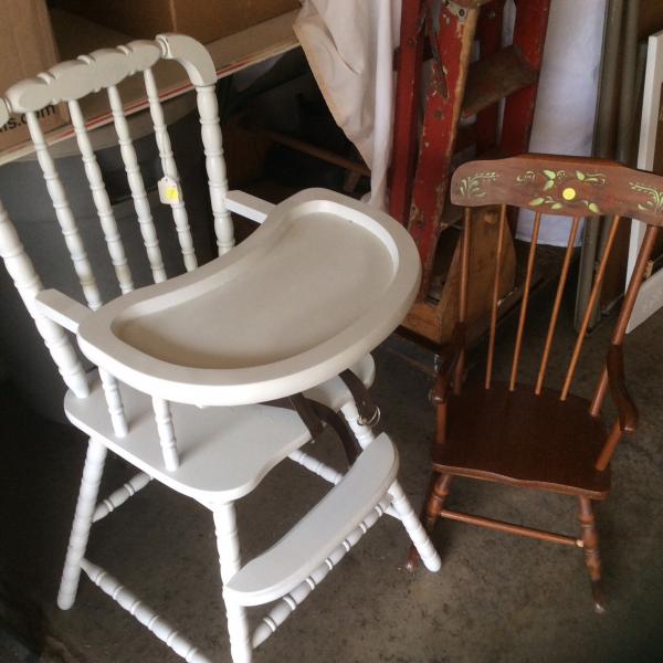Photo of White high chair and child’s rocking chair 