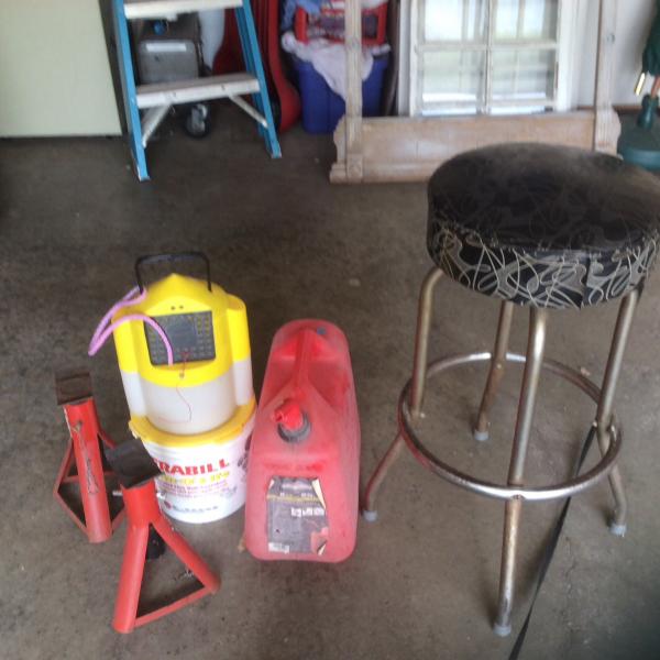 Photo of Jack stands, minnow buckets, gas can, and shop stool