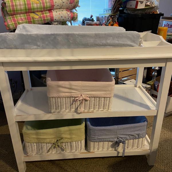 Photo of Pottery Barn Changing Table with baskets.
