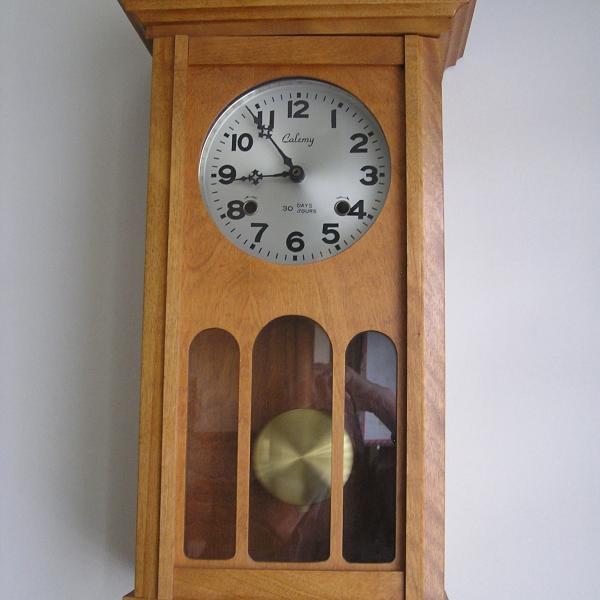 Photo of Older Battery Wooden Pendulum Clock