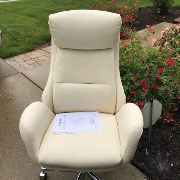 Photo of Beautiful swivel creme color office chair