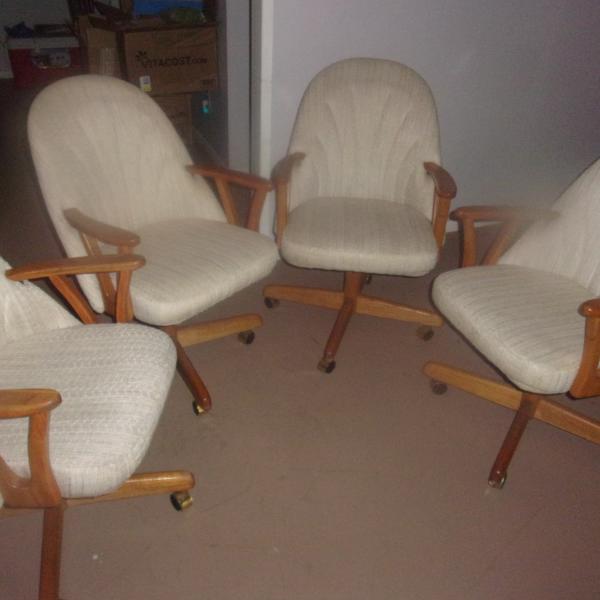 Photo of Four Rocking and Rolling Swivel Chairs 