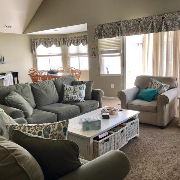 Photo of Olive green, microfiber sofa and loveseat 