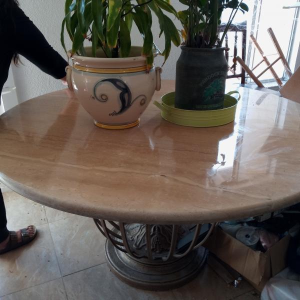 Photo of Marble table with 4 wrought iron chairs