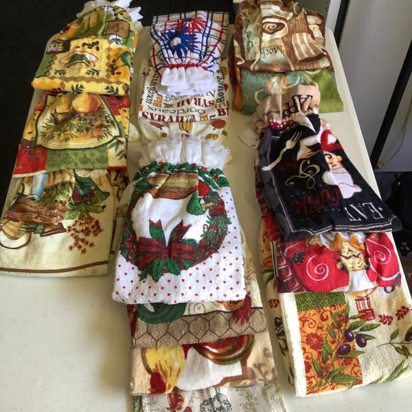 Photo of 36 assorted hanging kitchen towels