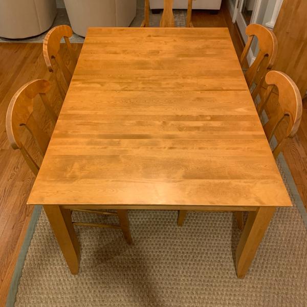 Photo of Beautiful handcrafted dining table with 4 chairs and a bonus arm chair