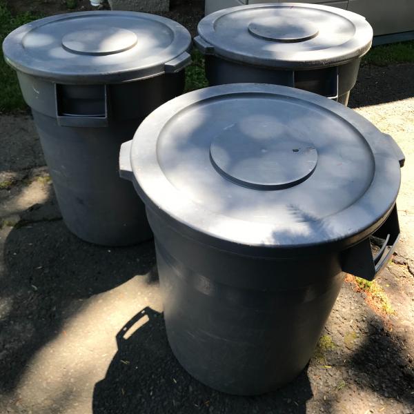 Photo of Rubbermaid 55 gallon trash barrels