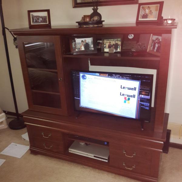 Photo of Sauder tv and dvr stand.