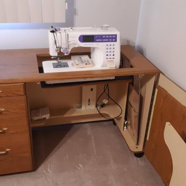 Photo of Memory Craft Sewing machine and cabinet