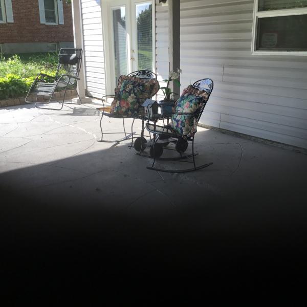 Photo of 2 Blue Iron Rocking Chairs with 2 pillows 