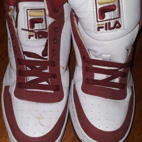 Photo of Red and white Fila shoes