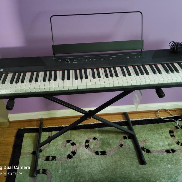 Photo of Alesis Recital Electric Keyboard  88 Keys With Stand 