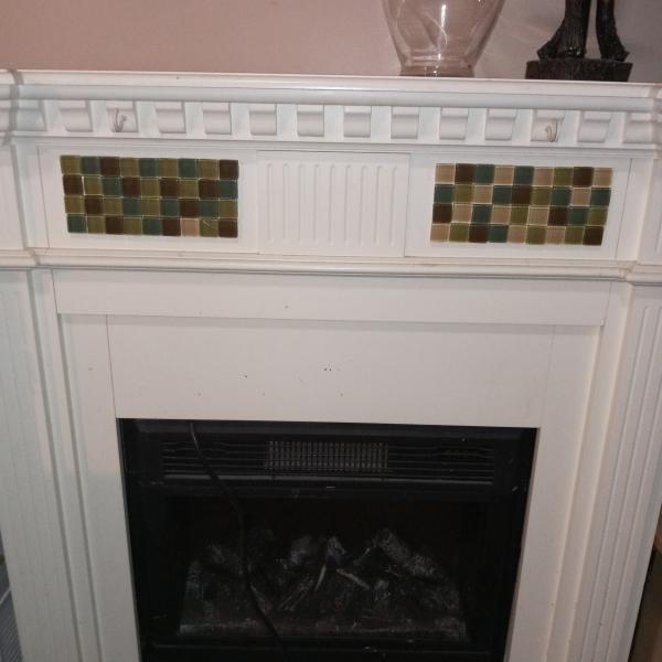 Photo of Stand with electric fire place