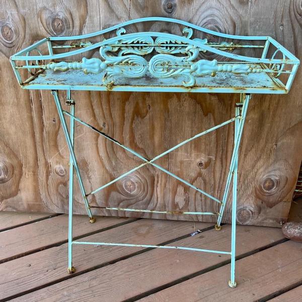 Photo of Folding Iron table painted turquoise
