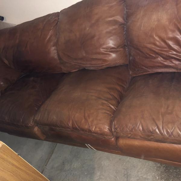 Photo of Brown leather sleeper sofa