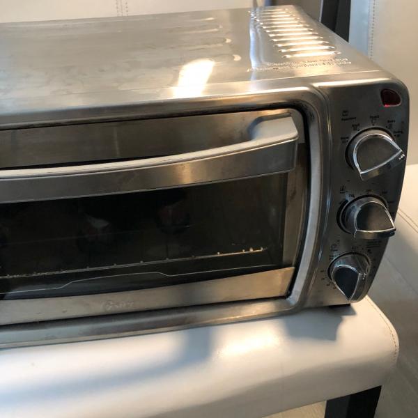 Photo of Oven , lots of electronic  , dishes and many more 