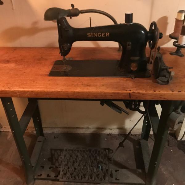 Photo of Antique industrial commercial sewing machine