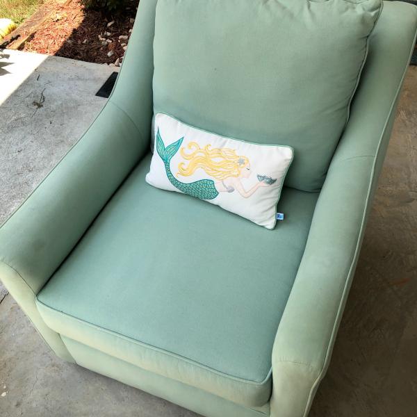 Photo of Seafoam green upholstered swivel rocker for The 