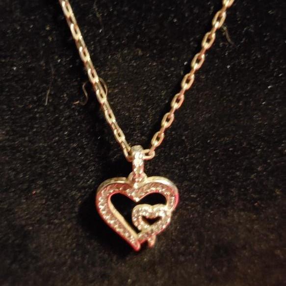 Photo of Sterling silver  necklace and heart pendant 