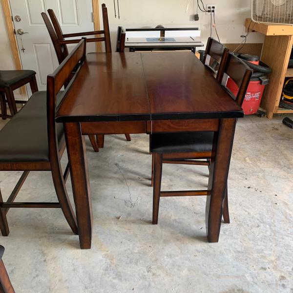 Photo of Table and chairs with bench