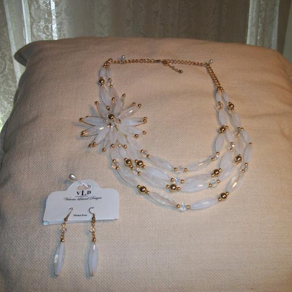 Photo of White and Gold Necklace with pierced earrings